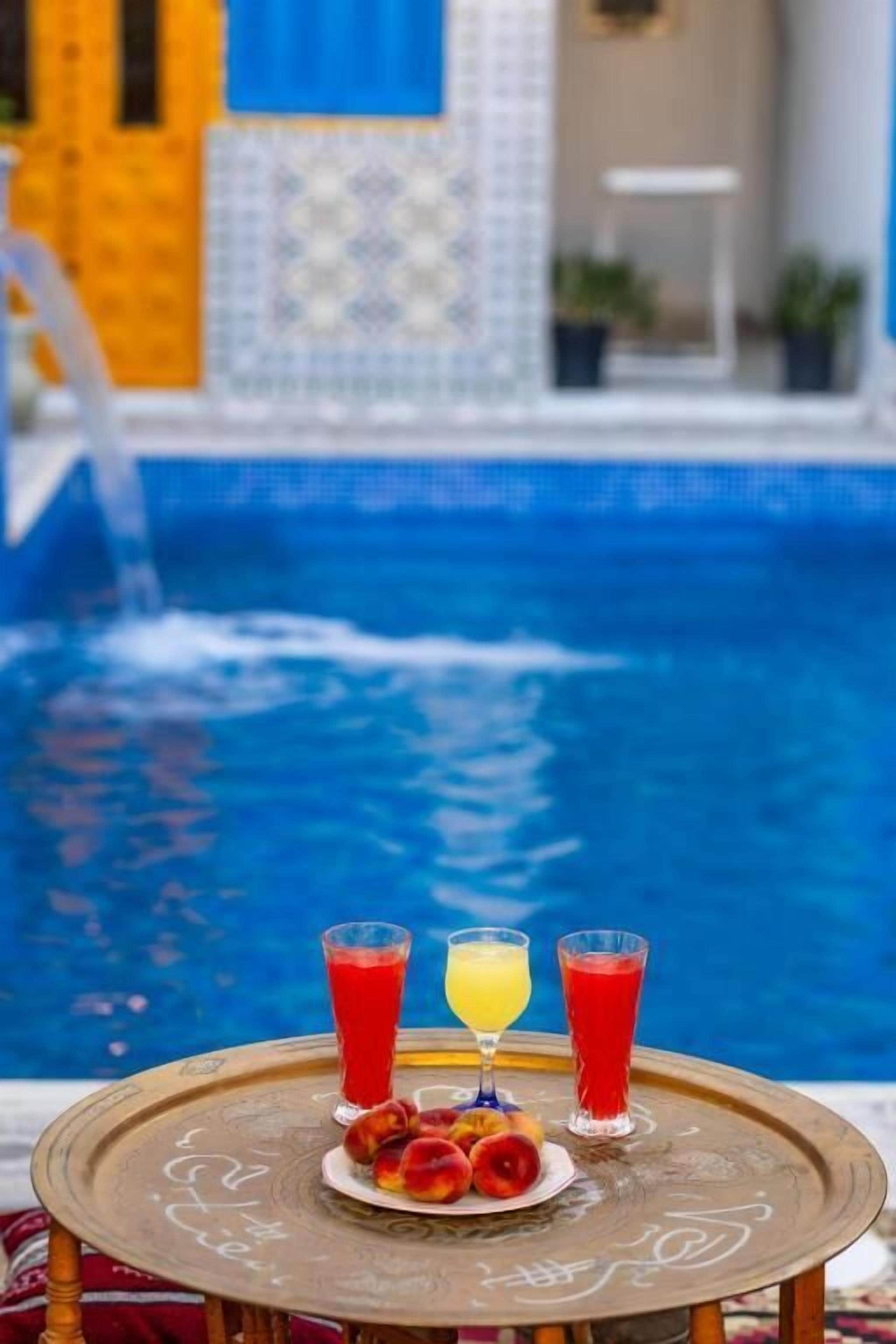 Deluxe Suite, Balcony, Garden View | Pool | Outdoor pool