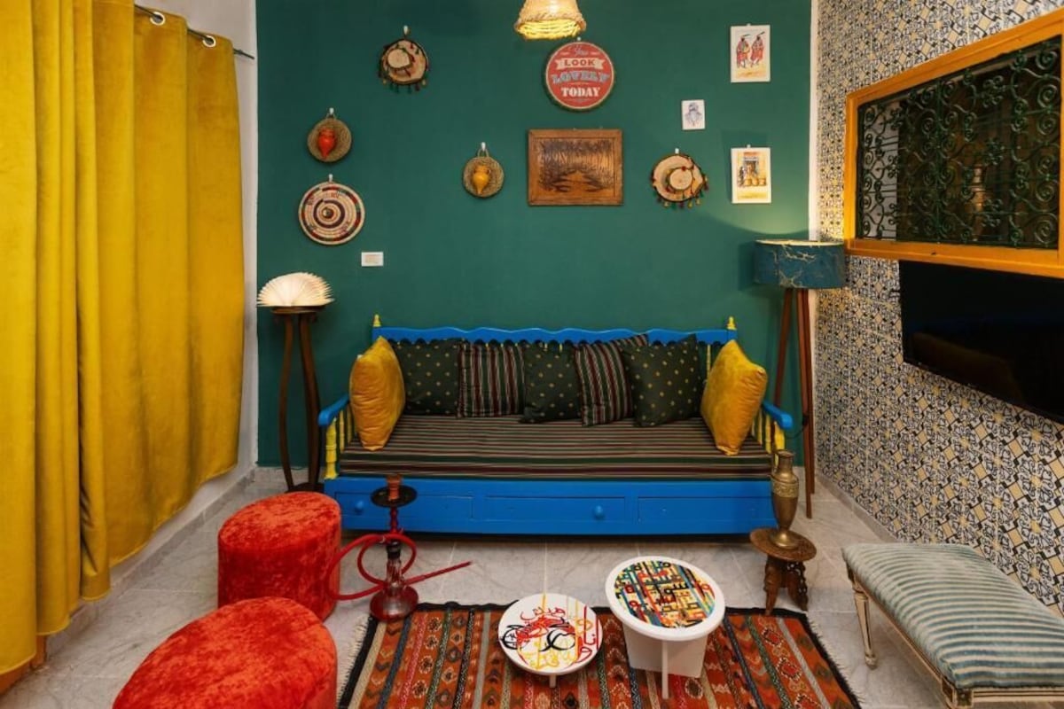 Deluxe Suite, Balcony, Garden View | Living area