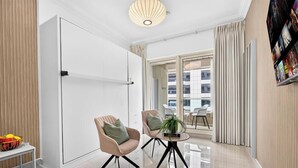 Standard Apartment, City View | In-room safe, blackout drapes, iron/ironing board, WiFi (free) - Marina Studio Pool View Walk to JBR (Dubai)