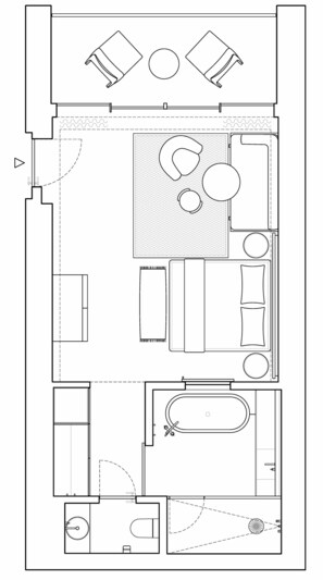 A floor plan with a living area, a dining area, a kitchen, a bathroom, and a small outdoor space.