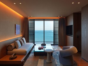 Quarto casal, sacada, vista para o oceano | Área de estar