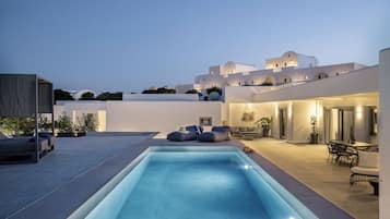 Seasonal outdoor pool, pool umbrellas, pool loungers