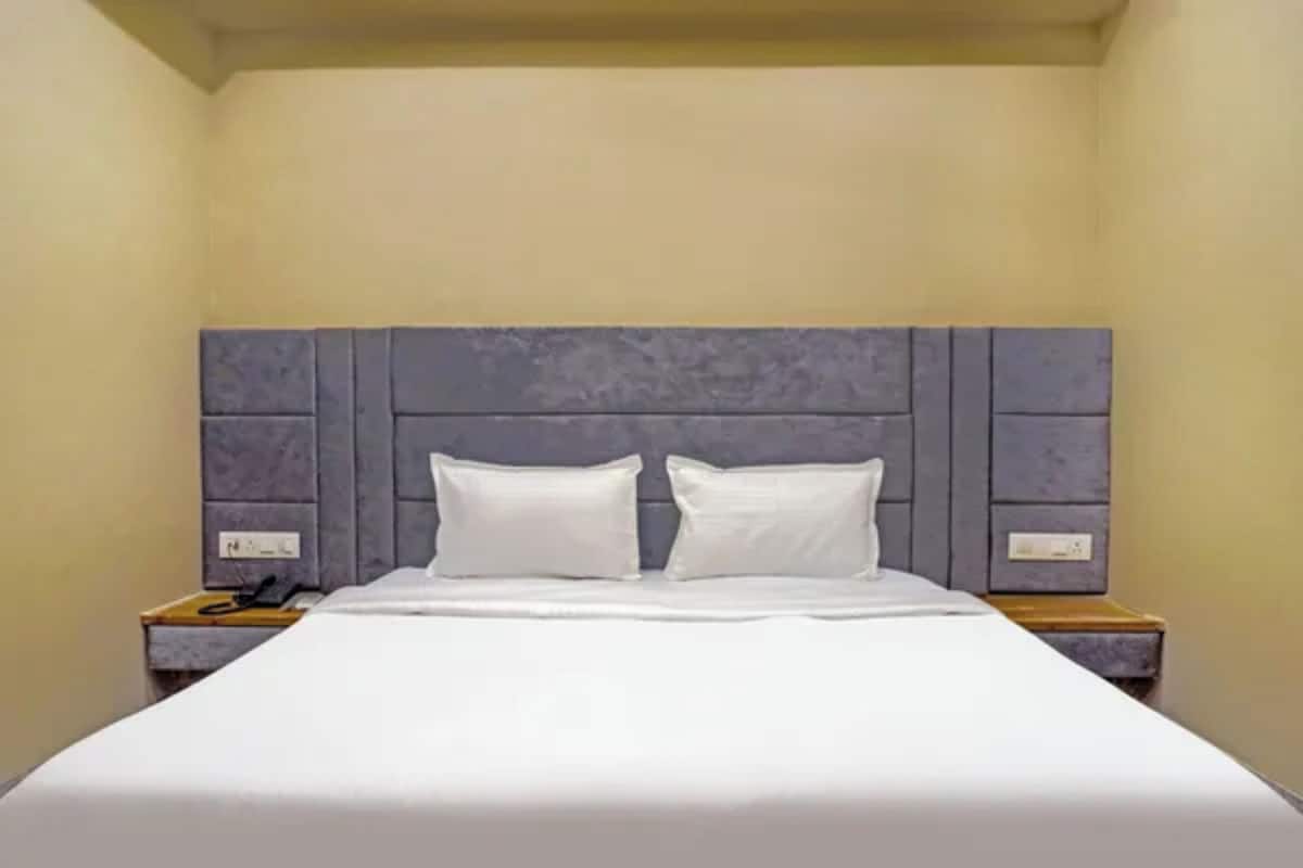 Habitación familiar | Sábanas de algodón egipcio y ropa de cama de alta calidad