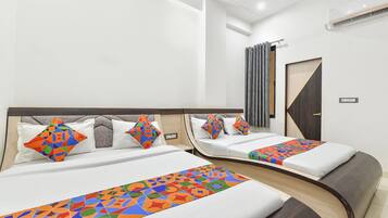 Habitación familiar | Sábanas de algodón egipcio y ropa de cama de alta calidad