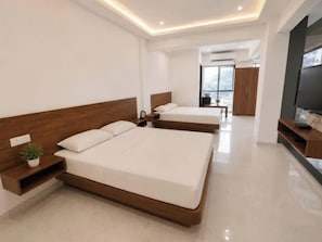 Egyptian cotton sheets, premium bedding, in-room safe, desk - Fabhotel Shivalik Prime Stay (Nashik)