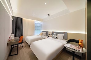 Kamar Twin Klasik | Minibar, tirai kedap cahaya, Wi-Fi gratis, dan seprai linen