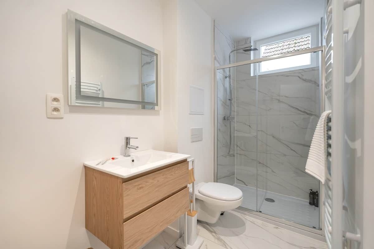 Hair dryer, towels, soap, shampoo