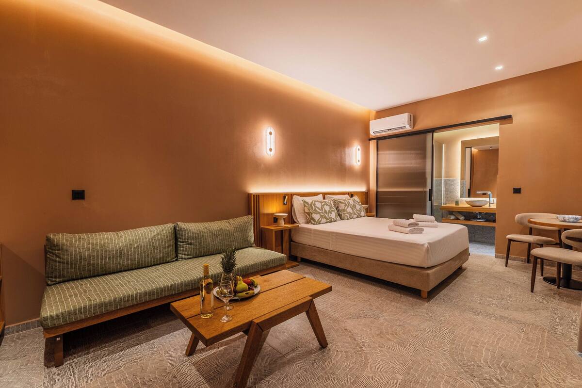 Deluxe Suite, Patio | Egyptian cotton sheets, premium bedding, down comforters