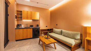 Deluxe Suite, Patio | Private kitchenette | Espresso maker, coffee/tea maker, mini-fridge, stovetop