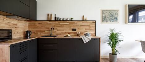 Espresso maker, fridge, microwave, stovetop