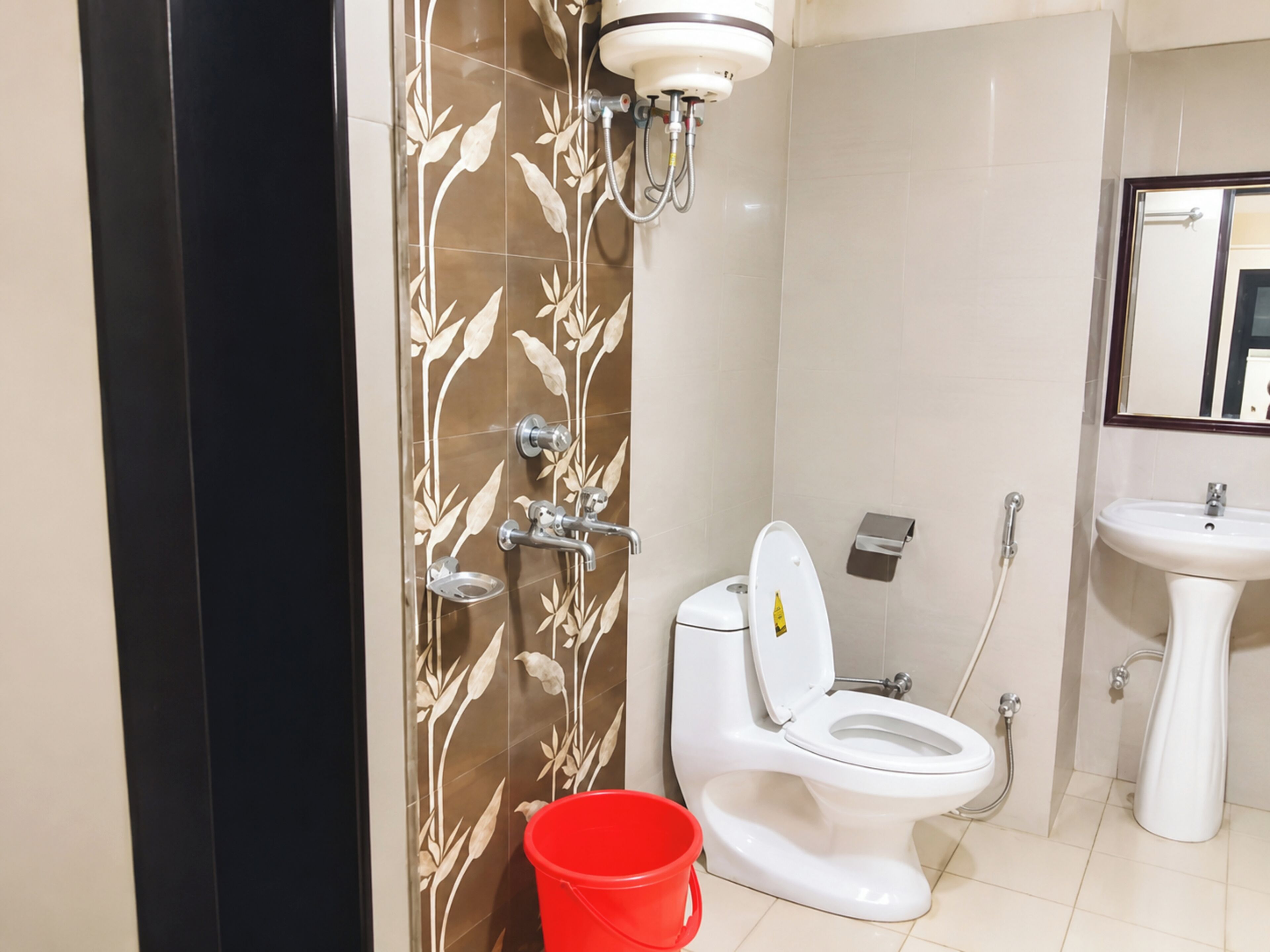 Shower, rainfall showerhead, slippers, towels