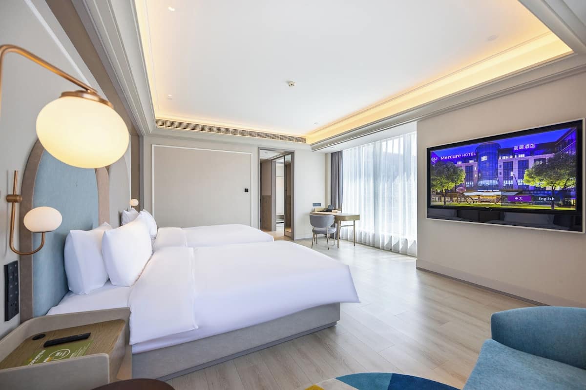 Habitación familiar, 2 camas matrimoniales | Ropa de cama de alta calidad, edredón y artículos del minibar gratis