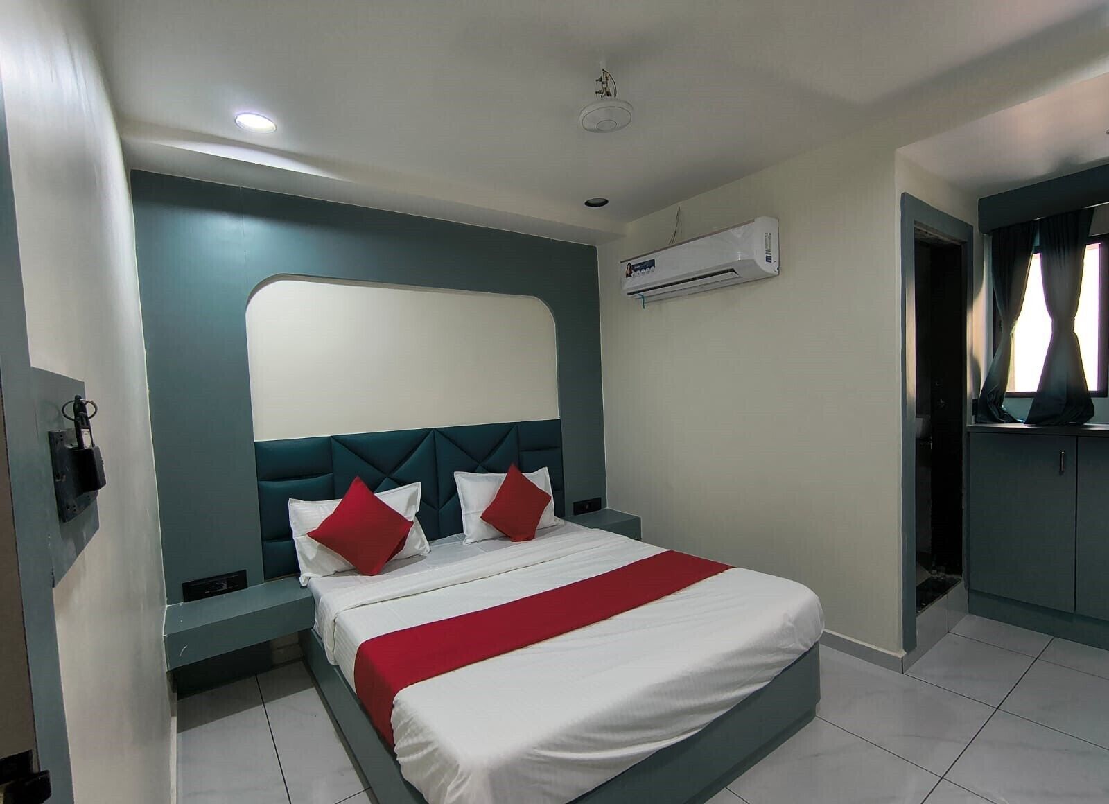 Deluxe Double Room, City View | In-room safe, desk, laptop workspace, iron/ironing board