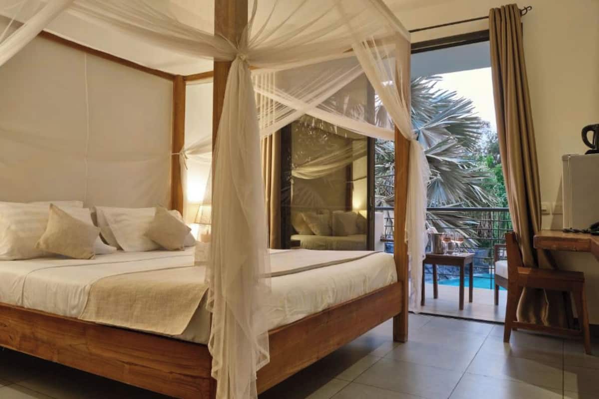 Habitación doble, balcón, vista a la alberca | Wifi gratis