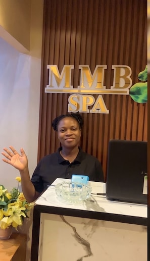 A reception desk with a sign that reads 'MMB SPA'. - Landmark Nike Lake Resort (Enugu)