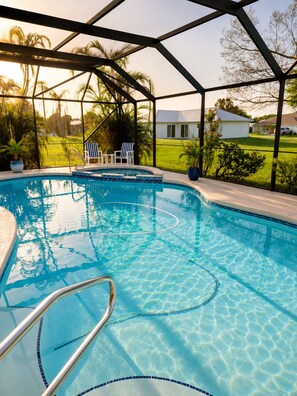 Outdoor pool, a heated pool - Casa Azul 4 Br/2Ba Pool Home, Sleeps 10 (Port St. Lucie)