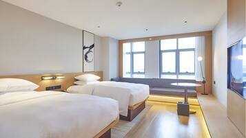 Premium bedding, down duvets, memory-foam beds, in-room safe