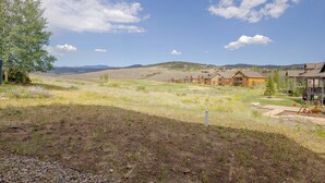 A residential area with houses, a playground, and a clear sky. - Hot Tub, Mtn Views, Resort Perks! Granby Getaway (Granby)