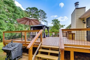 A wooden deck with a covered grill, outdoor seating, and a gazebo. - 5 Mi to Dtwn Greenville! Getaway w/ Deck & Yard (Greenville)