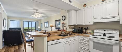 Coffee/tea maker, fridge, microwave, oven