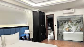 Luxury Room, City View | Desk, laptop workspace, WiFi (free), bed sheets