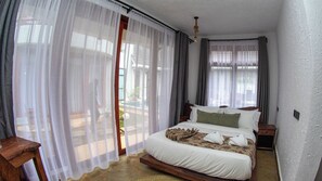 In-room safe, desk, laptop workspace, iron/ironing board (on request) - Olarashii River Lodge (Arusha)