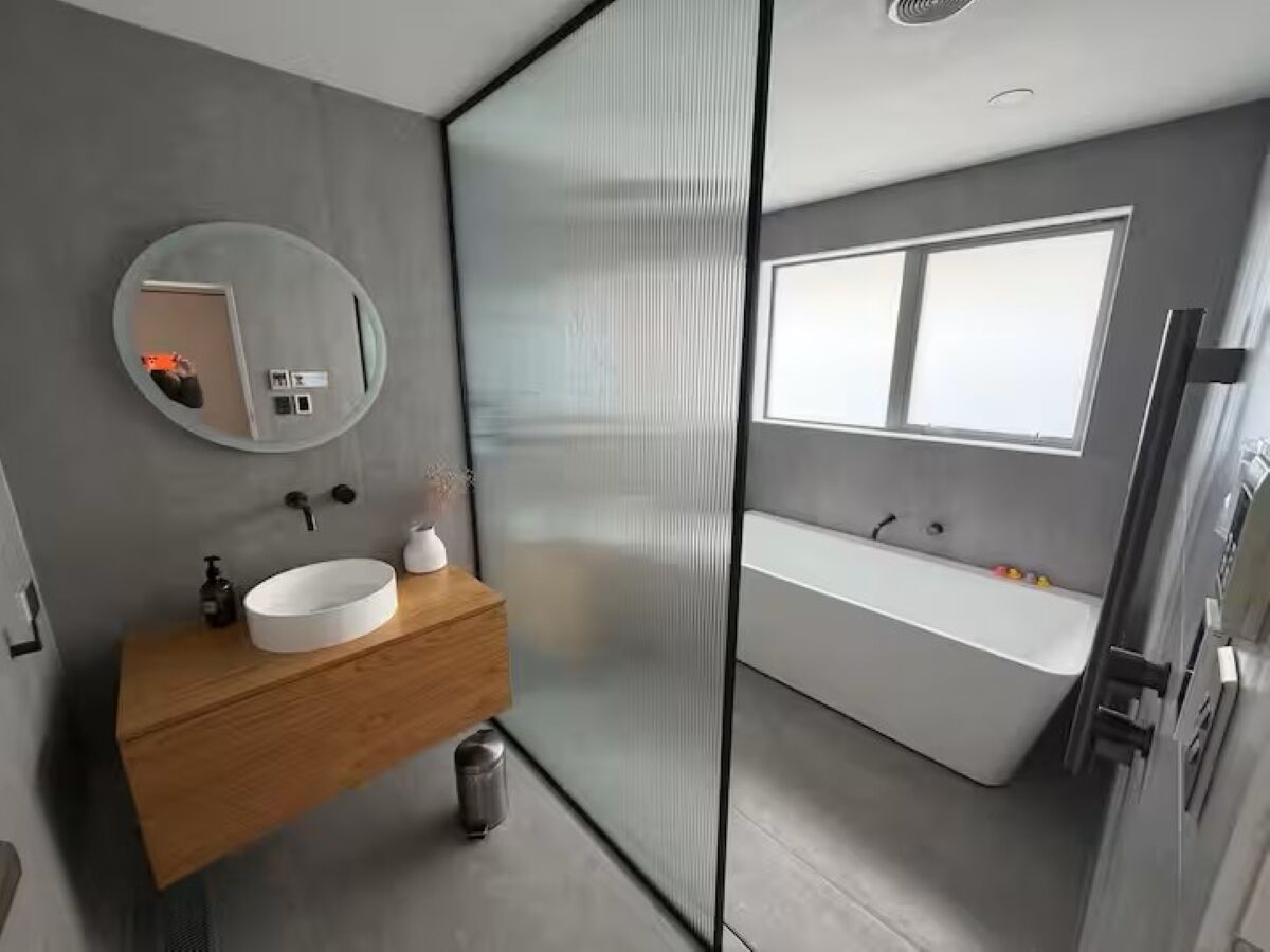 Shower, hair dryer, soap, toilet paper