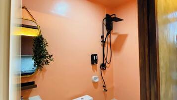 Bidet, towels, soap, toilet paper