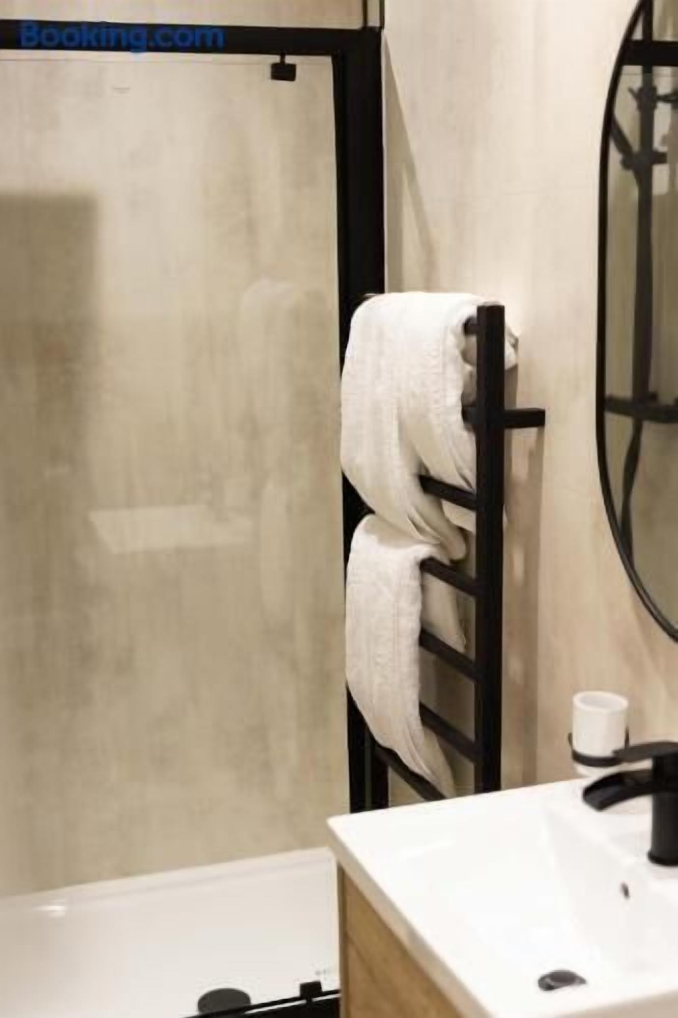 Shower, eco-friendly toiletries, hair dryer, towels