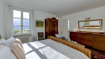 Premium bedding, down duvets, iron/ironing board, cots/infant beds