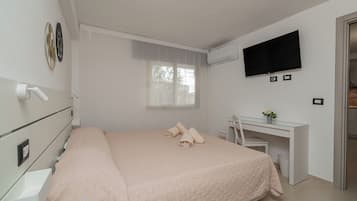 Apartamento Confort | Ropa de cama de alta calidad, escritorio, tabla de planchar con plancha