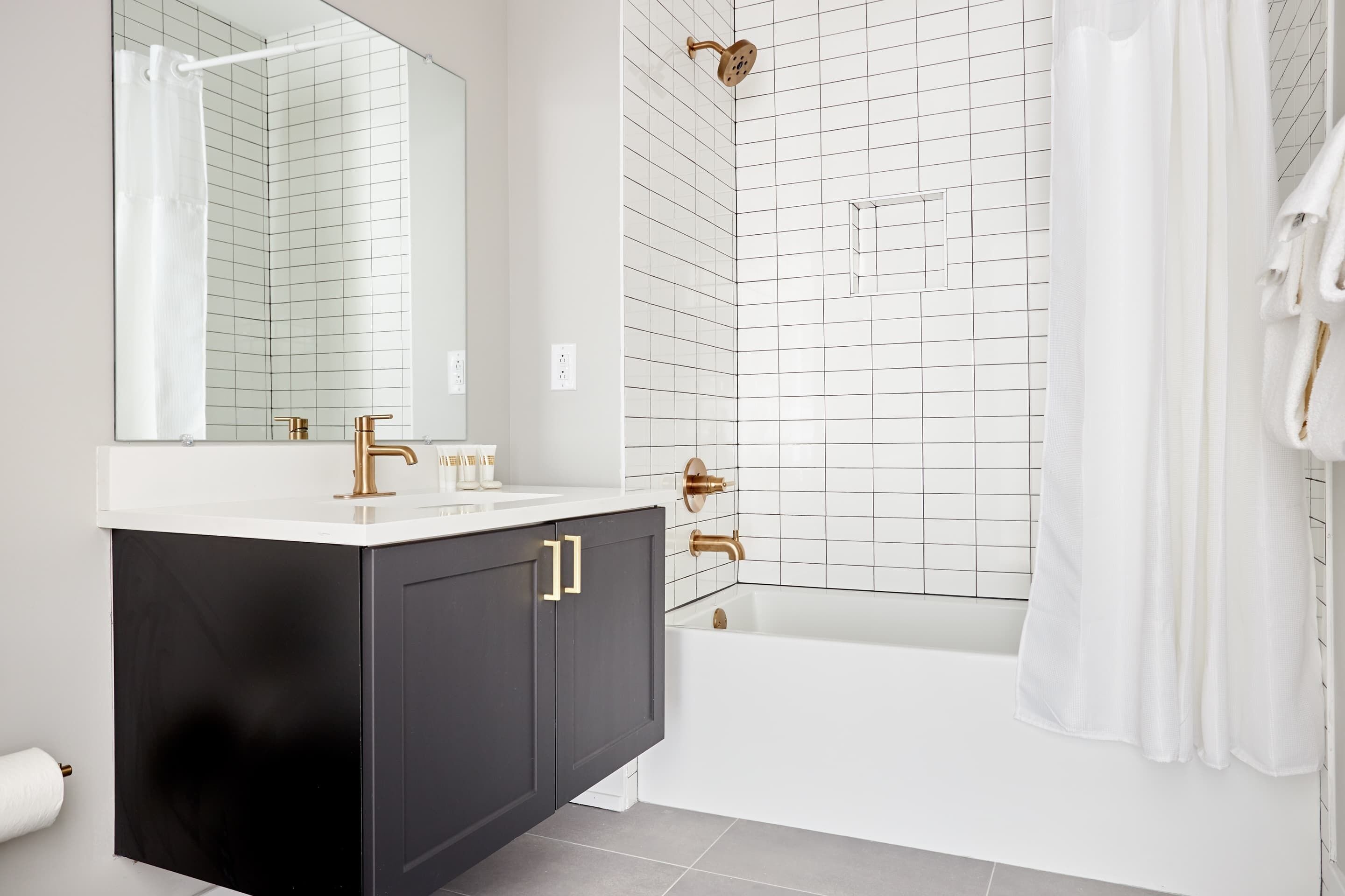 Shower, hair dryer, towels, shampoo