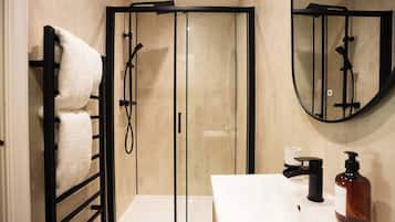 Eco-friendly toiletries, hair dryer, towels, soap