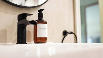 Eco-friendly toiletries, hair dryer, towels, soap