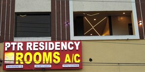 A signboard for 'PTR RESIDENCY ROOMS A/C' with contact numbers. - PTR RESIDENCY&ROOMS (Tiruvannamalai)