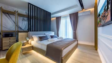 Premium bedding, down duvets, in-room safe, laptop workspace