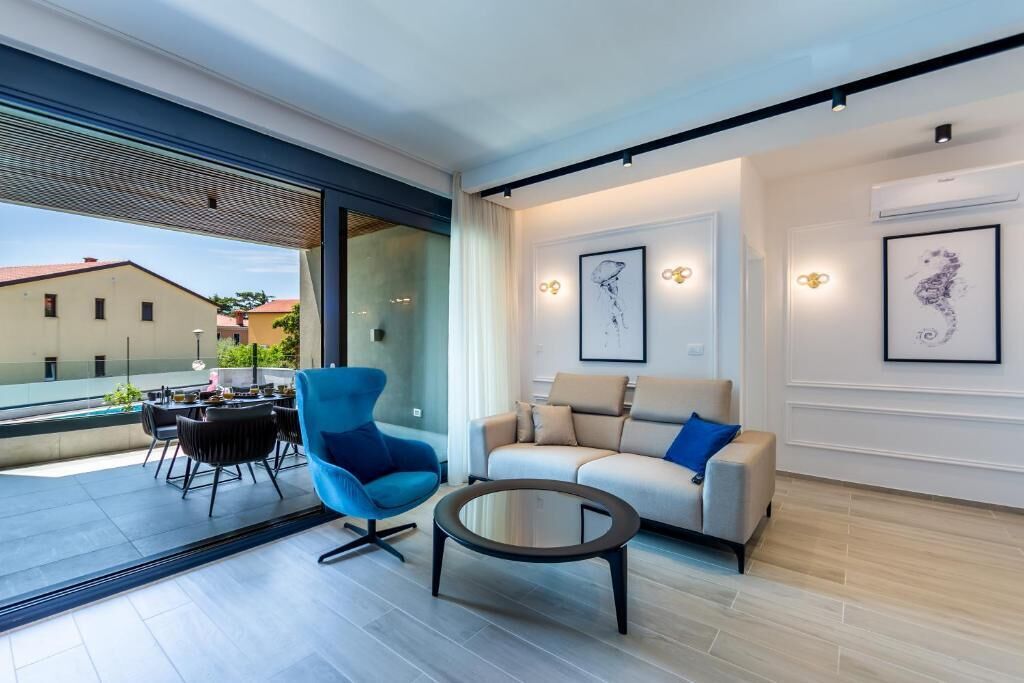 Departamento Deluxe, balcón, vista al patio | Interior