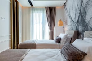 Deluxe Apartment, Balcony, Courtyard View | Premium bedding, down duvets, in-room safe, laptop workspace
