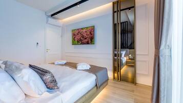 Apartemen Superior, balkon, pemandangan kolam renang | Seprai premium, selimut bulu angsa, dan brankas