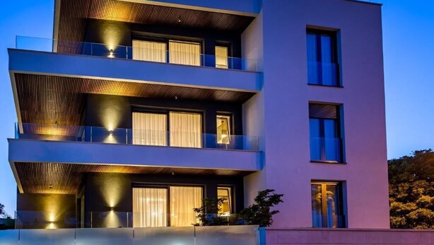 A multi-story building with balconies, large windows, and a flat roof. - Rocca Riviera  (Umag)