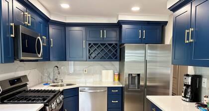 Spacious 4BR Home with Backyard. Near LIRR Direct to NYC 45 Mins. Malls & Shops!