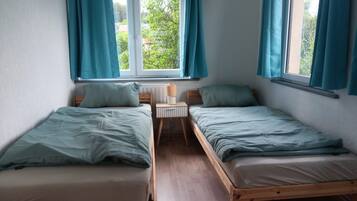 2 habitaciones y ropa de cama