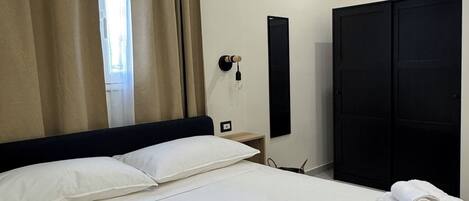 1 slaapkamer, een strijkplank/strijkijzer, wifi, beddengoed