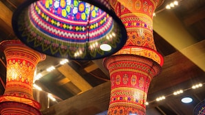 A hotel interior with multiple hanging decorative lights and a sign indicating the Sapa View restaurant on the 7th floor. - Mountain View Homestay SaPa (Sa Pa)