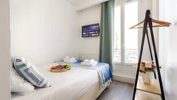1 habitación y ropa de cama