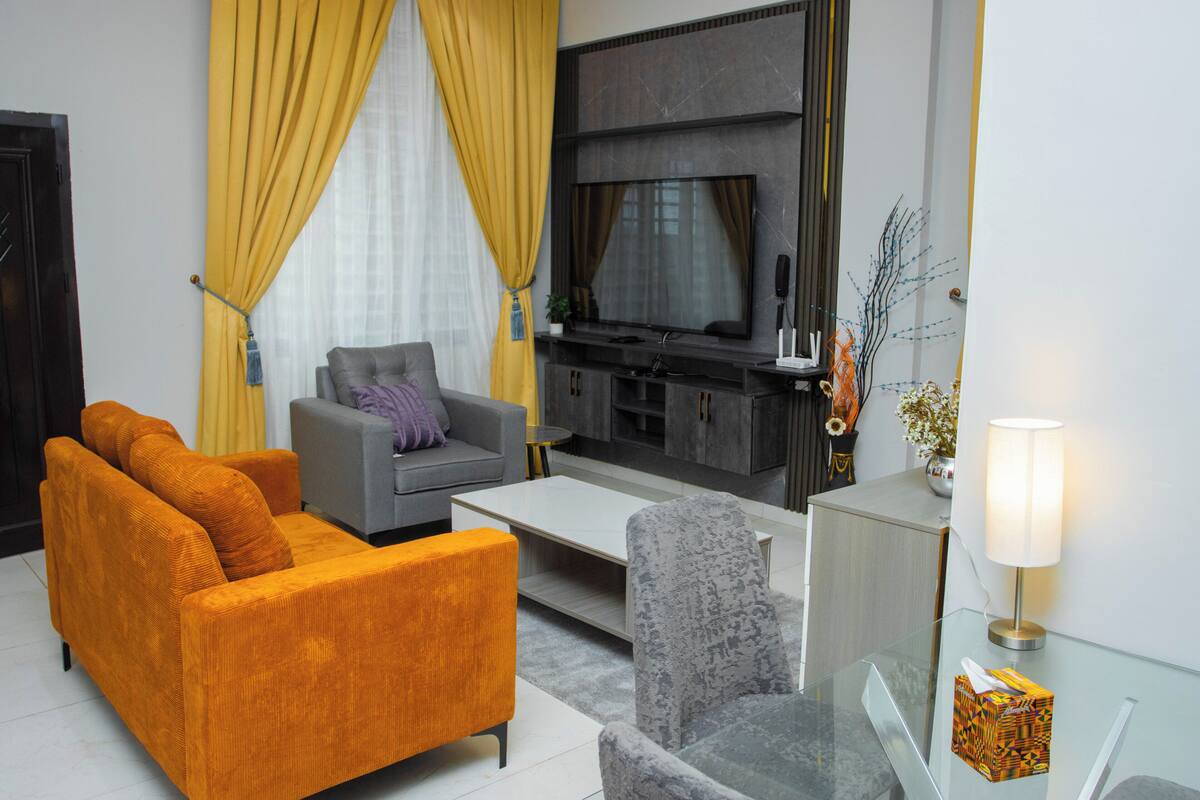 Luxury Apartment, 1 Bedroom, City View | Living area | 65-inch Smart TV with digital channels