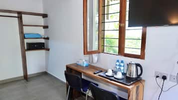 Bungalow, Patio, Garden View | Premium bedding, in-room safe, desk, laptop workspace