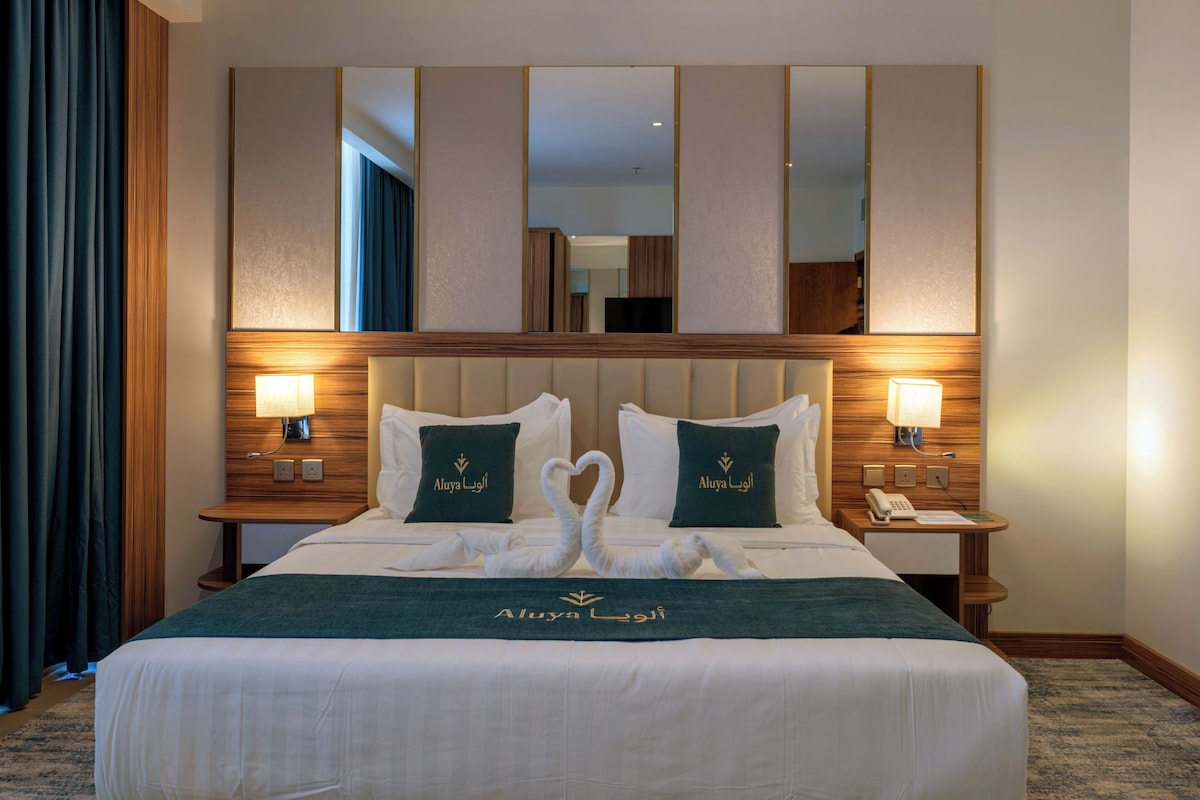 In-room safe, desk, laptop workspace, blackout curtains