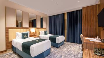 In-room safe, desk, laptop workspace, blackout curtains