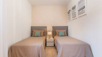 2 dormitorios, tabla de planchar con plancha, wifi y ropa de cama